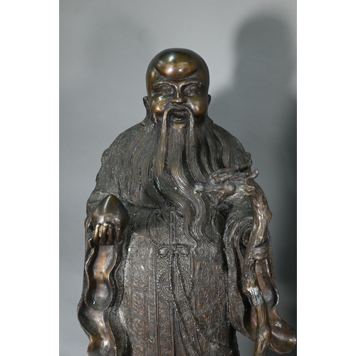 375 - Three large Chinese bronze 'Star Gods' (Sanxing) Fu, the personification of good fortune, depicted i... 