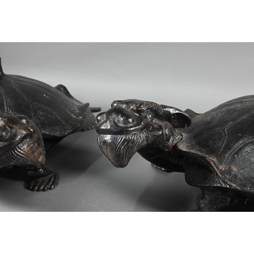 376 - A pair of large Japanese bronzed iron Minogame (Giant Mythological Turtle) okimono, with 'straw rain... 