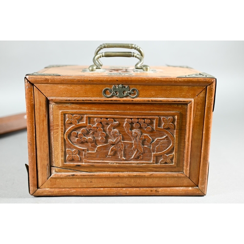 381 - A Chinese Mah Jong set, the carved wooden and brass mounted case with two carry handles and sliding ... 