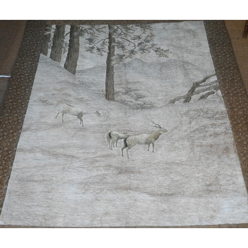 391 - An early 20th century Japanese textile wall hanging, ink on fabric landscape with long wooden pedest... 