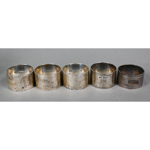 41 - Five various silver napkin rings and two serving spoons, 8.8oz total, to/w a silver and cut glass 's... 