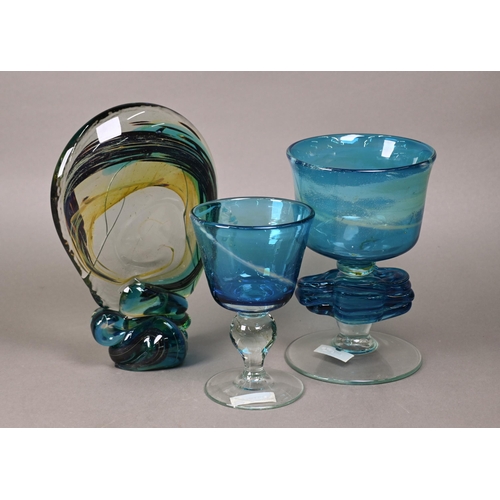 415 - A Mdina blue glass goblet, signed and dated 1977, 16 cm, to/w a larger unsigned goblet with free for... 