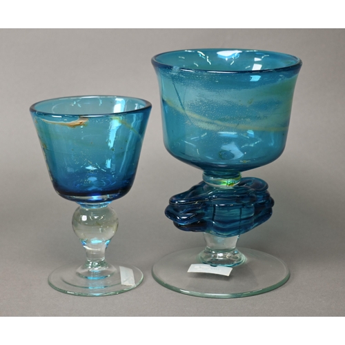 415 - A Mdina blue glass goblet, signed and dated 1977, 16 cm, to/w a larger unsigned goblet with free for... 