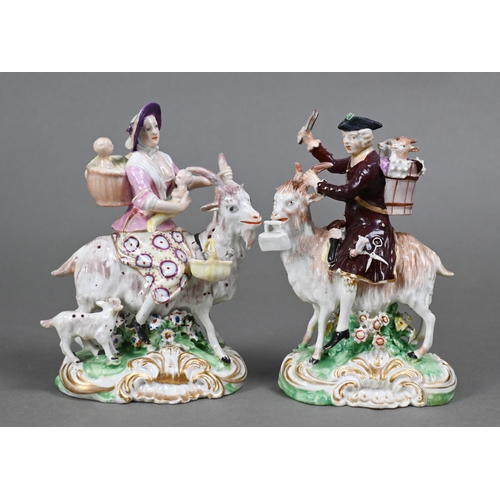 437 - A pair of Georgian Derby groups, The Welch Tailor and His Wife, mounted on goats, on shell-moulded b... 