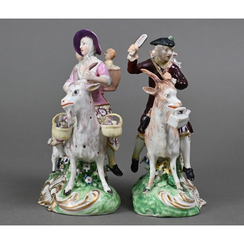 437 - A pair of Georgian Derby groups, The Welch Tailor and His Wife, mounted on goats, on shell-moulded b... 