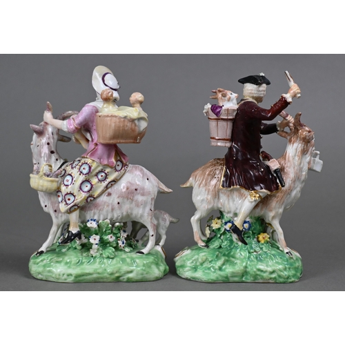 437 - A pair of Georgian Derby groups, The Welch Tailor and His Wife, mounted on goats, on shell-moulded b... 