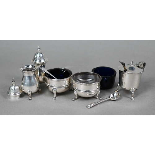 45 - A cased silver three-piece condiment set with spoons and various other silver condiments, etc., 7.8o... 