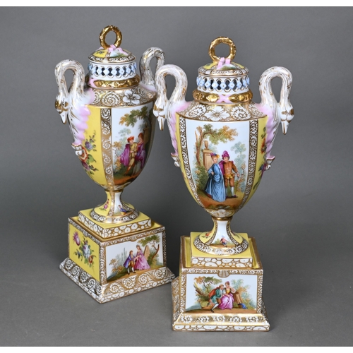 488 - A pair of Vienna porcelain urns and covers in the Dresden manner, painted with courting couples and ... 