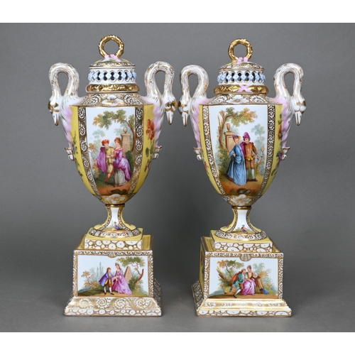 488 - A pair of Vienna porcelain urns and covers in the Dresden manner, painted with courting couples and ... 