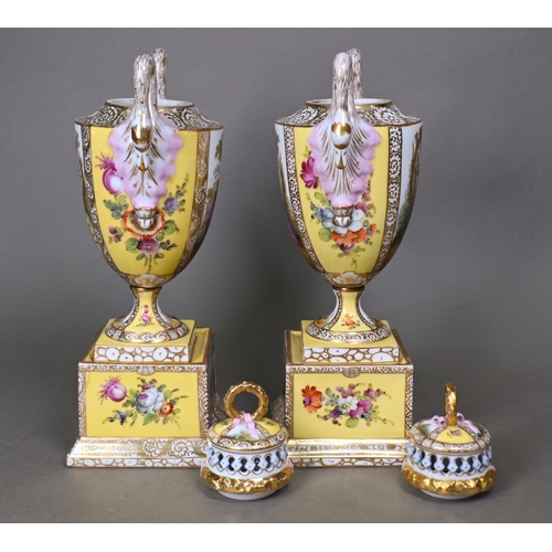 488 - A pair of Vienna porcelain urns and covers in the Dresden manner, painted with courting couples and ... 