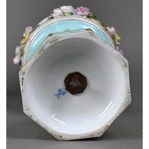 489 - A pair of 19th century Meissen garniture vases, with floral-encrusted covers above twin putti handle... 