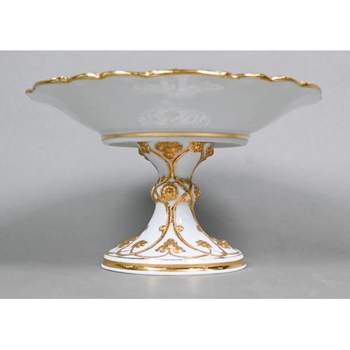 492 - An early 20th century Meissen comport, embossed and gilded with stylised vines, on flared foot with ... 