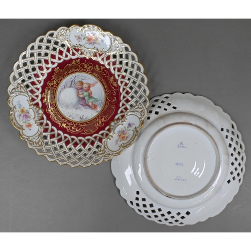 493 - A matched set of four Meissen/Dresden cabinet plates painted with children - three in winter setting... 