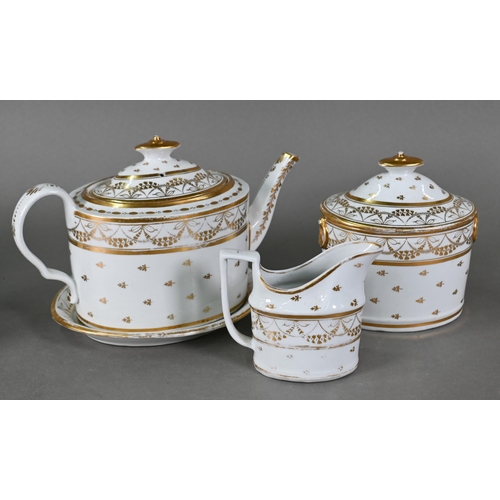 501 - A Regency china oval teapot, covered sugar basin and milk jug with gilt decoration and six matching ... 