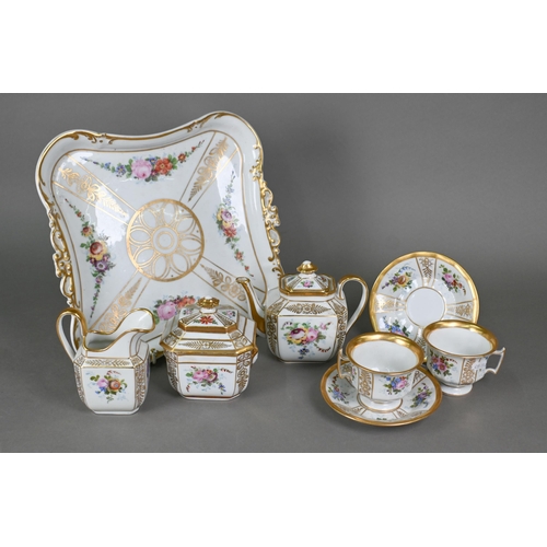 504 - An early 20th century Continental porcelain Cabaret tea service with floral painted decoration and g... 