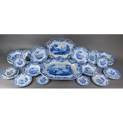 515 - A John and William Ridgway (1814-1830) blue and white dinner service, printed with Rural Scenery pat... 