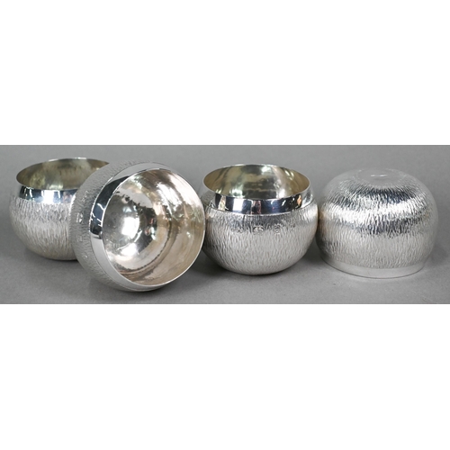 52 - Gerald Benney (1930-2008), a set of six globular silver beakers with typical textured decoration, Lo... 