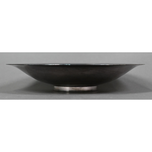 57 - Georg Jensen Ltd.: a planished silver shallow dish on collet foot, design no. 620 B, London import 1... 