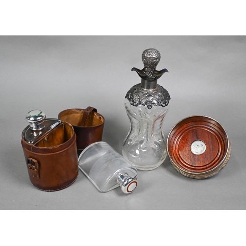 58 - An Edwardian cased pair of glass huntsman's spirit flasks of semi-circular form, the silver bun cove... 