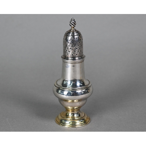 64 - A George III silver baluster pounce pot with flame finial and parcel gilt foot, Jabez Daniell & ... 