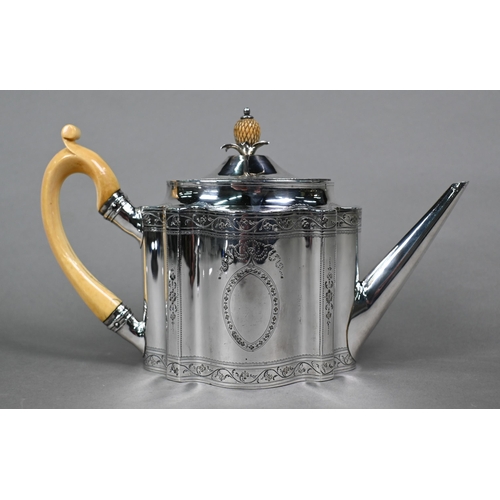 67 - A George III silver teapot of ogee form with engraved decoration, ivory scroll handle and carved 'pi... 