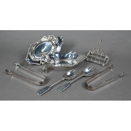 71 - An Edwardian pair of silver bonbon dishes, Birmingham 1908, a small toast rack, Sheffield 1903 and a... 