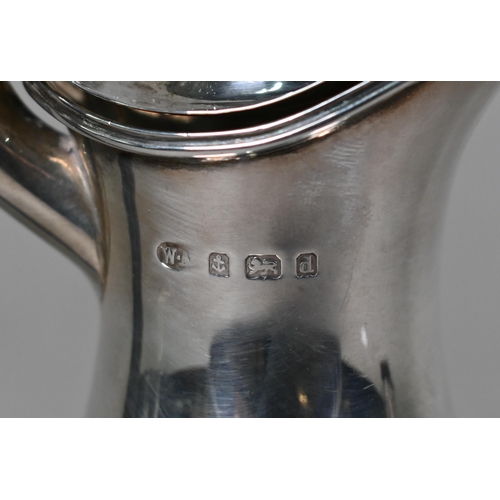 74 - An Edwardian silver half-fluted hot water jug in the Adam Revival manner, William Adams Ltd., Birmin... 