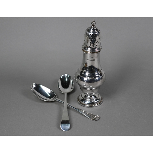 83 - A silver baluster sugar caster, Birmingham 1937, 21cm high, to/w two 18th Century tablespoons (marks... 