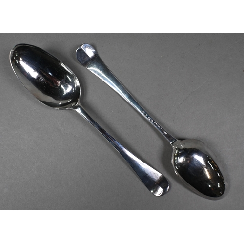 83 - A silver baluster sugar caster, Birmingham 1937, 21cm high, to/w two 18th Century tablespoons (marks... 