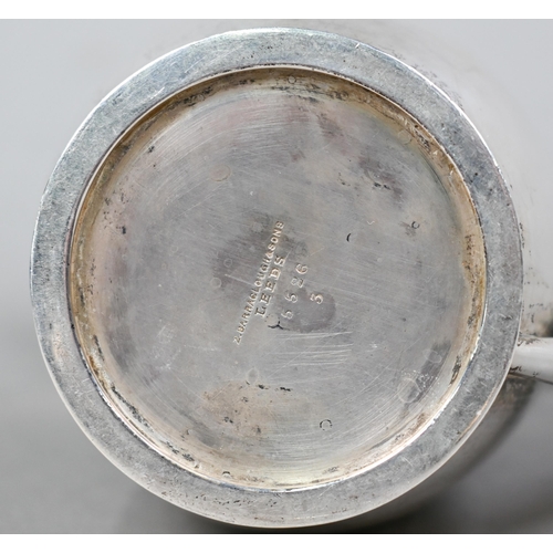 90 - A silver hot water jug of ovoid form with composite handle and finial, Z Barraclough & Sons, She... 