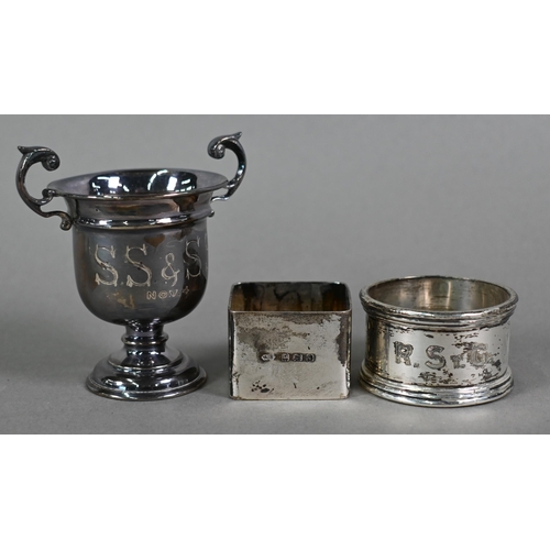 95 - A pair of silver bonbon dishes, London 1968, to/w two napkin rings, a small trophy cup and various t... 