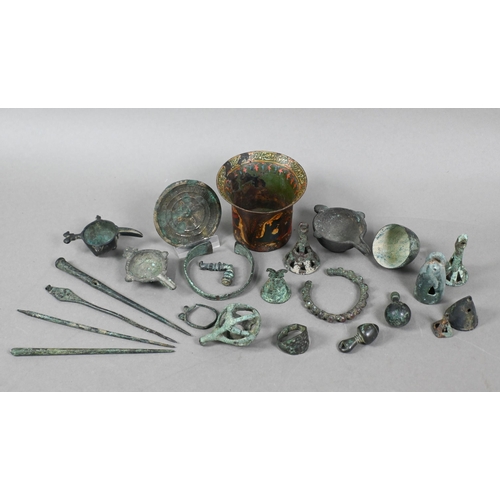 1119 - An collection of assorted antique bronze objects of Luriston origin, including three small crucibles... 