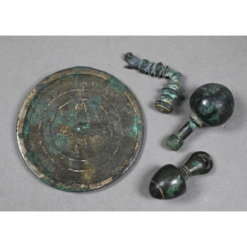 1119 - An collection of assorted antique bronze objects of Luriston origin, including three small crucibles... 