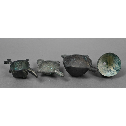 1119 - An collection of assorted antique bronze objects of Luriston origin, including three small crucibles... 