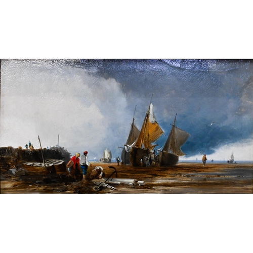 675 - E J Niemann (1813-1876) - Fishing vessels at low tide, oil on panel, signed lower left, 21 x 38.5 cm