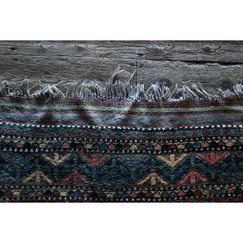 789 - A vintage Turkish carpet, repeating geometric design on pale terracotta ground and kilim finished en... 