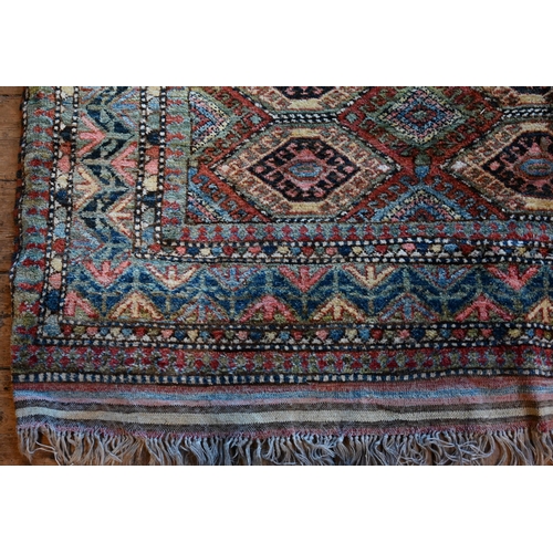 789 - A vintage Turkish carpet, repeating geometric design on pale terracotta ground and kilim finished en... 