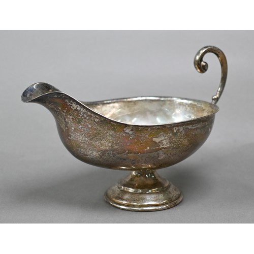 36 - A Mexican silver sauce boat and ladle, stamped 'Sterling', to/w a punch ladle, a pastry slice and an... 