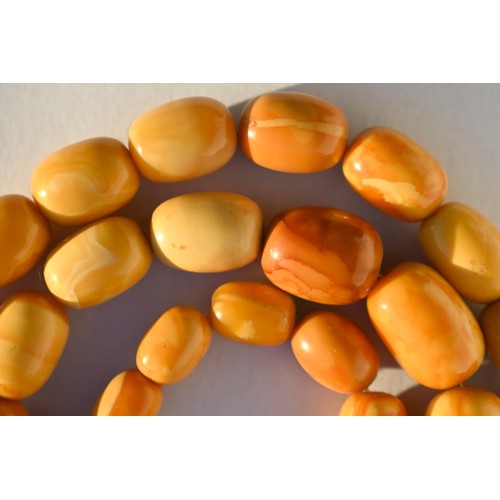 245 - A row of butterscotch amber beads on screw clasp, a/f, approx 30g