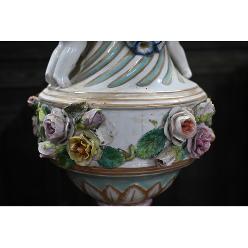 489 - A pair of 19th century Meissen garniture vases, with floral-encrusted covers above twin putti handle... 