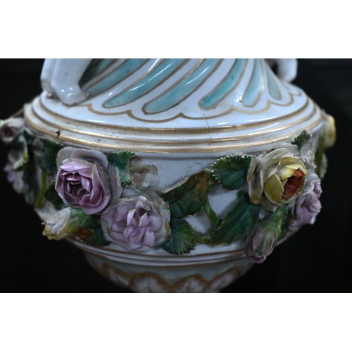 489 - A pair of 19th century Meissen garniture vases, with floral-encrusted covers above twin putti handle... 