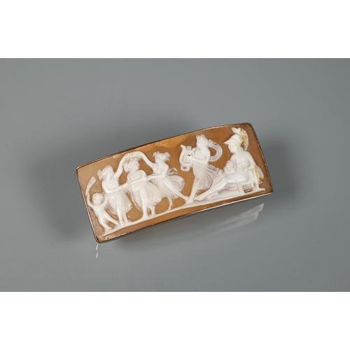 166 - A shell cameo rectangular brooch featuring a classical frieze of figures dancing to harp player, pla... 