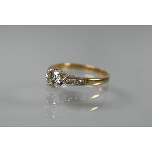 195 - A diamond ring, the central round brilliant cut diamond of approx 0.5 carats with millgrain diamond ... 