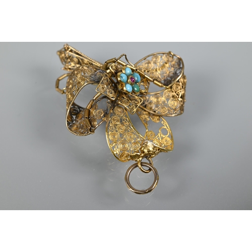 225 - An antique yellow metal filigree pendant, with central turquoise and garnet set cluster, a/f