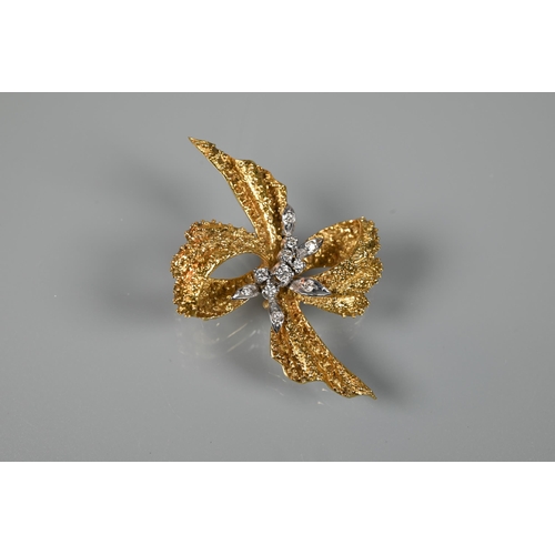 An 18ct yellow gold brooch of textured form, set with mixed cut diamonds, in the form of a bow, approx 17.6g all in, 5 x 4 cm overall pin requires attention and does not close securely