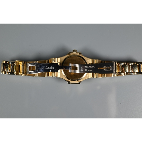 320 - A ladies Patek Phillipe Nautilus 18ct yellow gold bracelet wristwatch, quartz, ref. 4700J, No. 15307... 