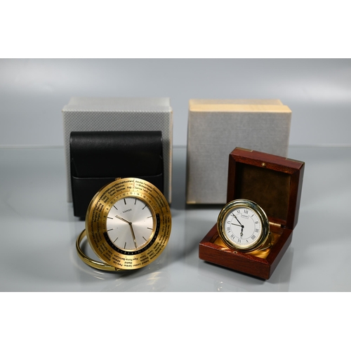 336 - A Swiss Luxor world time travel clock, model 2005, within a leather travel case, c/w warranty card a... 