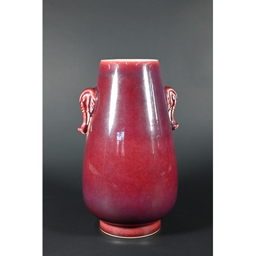 354 - A Chinese langyao monochrome vase with elephant mask handles and crushed raspberry red glaze, the ba... 