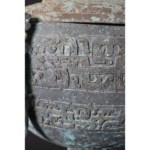 356 - A Chinese bronze ritual food vessel and cover in the Warring States style, Dou, the bowl has four ca... 