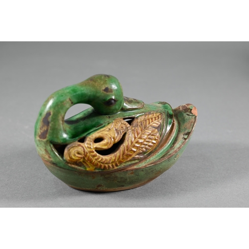 368 - A Chinese Song style stemmed fruit dish with olive green glaze and relief mythical beast decoration,... 